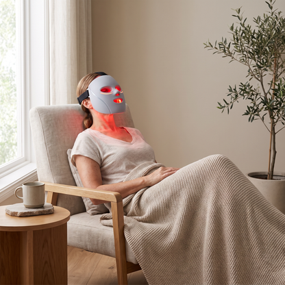 Omnitality SpectraFlex Multi-Light Face Mask in a relaxed at-home wellness routine